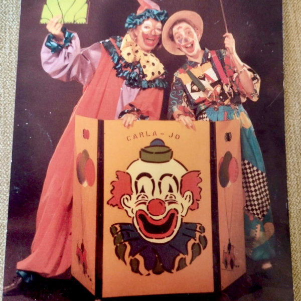 Carla as a clown, with her mum also dressed up